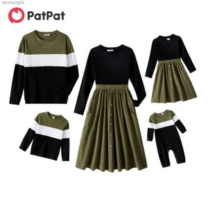 Abiti coordinati per la famiglia Pa Abiti coordinati per la famiglia Abiti a maniche lunghe con bottoni sul davanti Abiti impiombati solidi e top in maglia a coste color block Set di vestiti per la famiglia