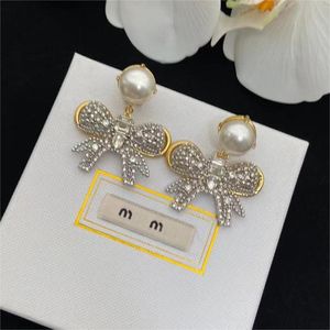 Mu brand luxury bowknot designer earrings stud for women shining crystal diamond knot sweet flower CZ zircon earring ear rings earings jewelry gift