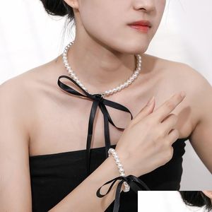 Chokers Goth Wedding Party Biżuteria długa czarna wstążka Naszyjnik dla kobiet Elegancki biały imitacja Pearl Beach Naszyjniki wakacyjne OTHCD