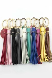 Unika personliga monograms -blanker Emaljskivläder Tassel Keychain Inledande graverade runda lädernyckelkedjor för väskbil KE1612541