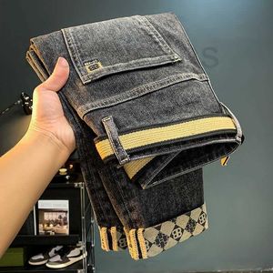 Jeans masculinos Designer versão coreana de jeans masculino elástico slim fit versátil luxo pequeno tubo reto simples e moderno Instagram bordado casual calças compridas