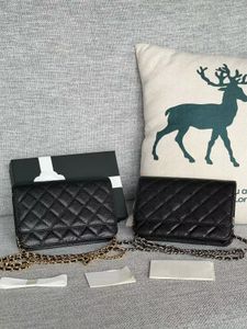 10A Borsa a tracolla mini woc in pelle classica e alla moda con cerniera in pelle di autenticazione mini borsa a tracolla da donna in pelle di pecora caviale scozzese 33814