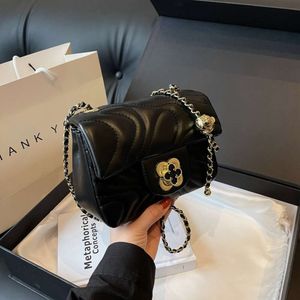 Xiaoxiangjia Rotating Lock Buckle Popular Shoulder 2024 New Instagram Small Design Woven Chain Crossbody Women's Bag 75% Factory Wholesale