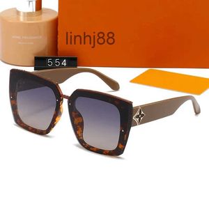 Óculos de sol moda redonda óculos de sol 554 designer marca preto quadro de metal escuro lentes de vidro de luxo para homens mulheres melhor marrom19em