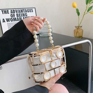 Shoulder Bags Hollow Pearl Water Diamond Bird Cage Bag Dinner Internet Red and Western Style Handheld Chain Crossbody 2024 New Single Room 240427