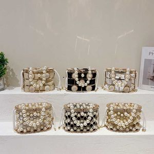 Evening Bags Pearl Handheld Banquet Bag for Women 2024 New Fashion Diamond Cage Water Bucket Bag Chain Strap Cross Body 240227