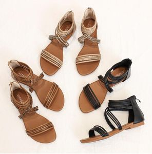 Sandalen Damen 2024 neue vielseitige Feen-Stil römische Spitze flacher Boden böhmische Strandschuhe