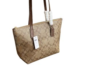 Totspåsen läder axelpåsar designers kvinna crossbody topp kvalitet handväska hög volym tote för kvinnors shopping resor billiga designer väskor damer plånböcker