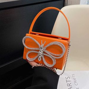 Torby na ramię 2024 NOWOŚĆ modne i proste cukierki ręczne damskie Diamond Bow Crossbody Mała kwadratowa torba 240427