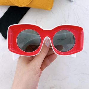 Kvinnors solglasögon för kvinnor män solglasögon mens 400331 modestil skyddar ögonen UV400 -linsens toppkvalitet med case231g