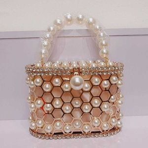 Shoulder Bags Hollow Out Pearl Water Diamond Full Sky Star Bird Cage Bag Dinner Internet Red and Fashionable Handheld Chain Crossbody Women s Premium 240427