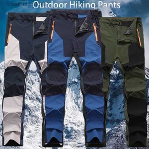 Herrbyxor Nya män utomhusvattentäta vandringsbyxor Camping Klättring av fiskeskidåkning Trekking Softshell Pants Plus storlek 5XL T240227