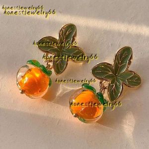 Stud Stud Stud Earrings Creative Persimmon Orange Color Flower Leaf For Women Earrings Jewelry Painting Oil Glazed Glass Trend Jewelry Wholesale 2024