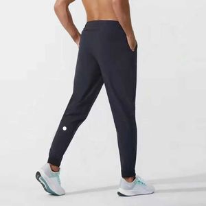 2024 LululemenI Mulheres Calças Curtas Yoga Outfit Jogger Esporte Quick Dry Cordão Ginásio Bolso Sweatpants Calças Mens Casual Cintura Elástica Fies 55uu