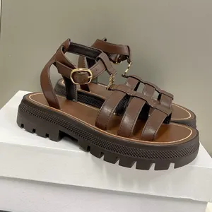Luksusowe sandały designerskie płaskie slajdy Raffii tkane sandały modne otwarte palce rzymskie sandały kostki klamra letnie buty plażowe na zewnątrz nadruk 35-41