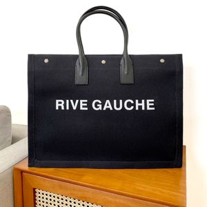 여자 남성 Rive Gauche Travel Shop 디자이너 가방 고급 럭셔리 탑 핸들 대형 해변 토트 가방 7A 린넨 캔스 핸드백 가방 패션 어깨 클러치 크로치 바디 렌더 백