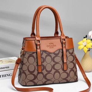 Women's 2024 New Printed Handbag with Large Capacity, Quality, Fashionable and High End Big Bag Hot Selling 75% Factory Wholesale