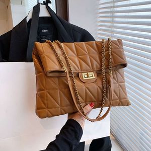 Grade bordada linha grande capacidade para mulheres 2024 nova popular versátil corrente crossbody moda um ombro pequena bolsa quadrada 75% atacado de fábrica