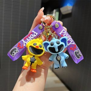 卸売バルクカーキーチェーンかわいいアニメキーチェーンチャーム怖い笑顔の動物人形カップル学生パーソナライズされたクリエイティブバレンタインデーギフトA89 DHL