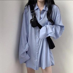 Kvinnors blusar Långärmad skjorta för kvinnor hösten 2024 En mångsidig och lös passande mittlängdsdesign med sensnisch