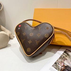 M57456 Coeur bag fashion old flower Love bag Dotted red heart shoulder bag crossbody package Leather designer bag evening bags