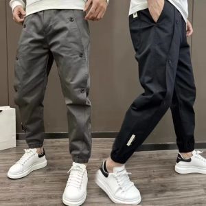 Calça calças de carga masculino Menas de moda 2023 Novos botões laterais Hip Hop Joggers masculinos calças de rua japonesas casuais calças cinzas homens