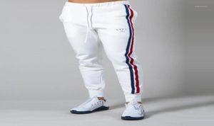 Pantaloni sportivi da jogging bianchi da uomo Pantaloni skinny casual in cotone Pantaloni da palestra per allenamento fitness Pantaloni da uomo sportivi primaverili da uomo0392718445