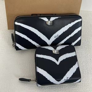 CM591 CM780 Mid Length Zippered Purse with Zebra Stripes, Genuine Leather, Multiple Card Slots, and Zero Wallet