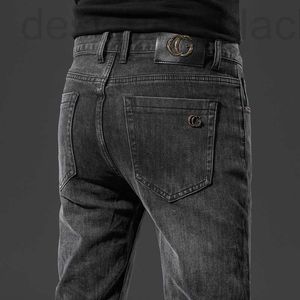 Designer-Herren-Jeans und Herbst-Winter-Jugend-Jeans, elastisch, klein, gerade Passform, koreanische schwarze Marke mit Füßen 24ss