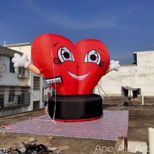 Atacado 2024 desenhos animados infláveis bonitos do coração com base preta para o dia dos namorados/decoração de festa