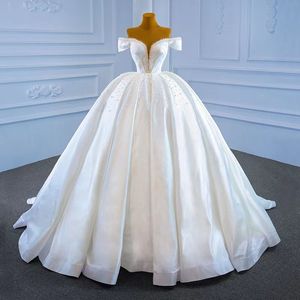 2024 luxury Satin Wedding Dresses Sexy Beads pearls beaded Ruched Long Train Bridal Gowns Robes 2024 Dubai Arabic off shoulder lace up beach bride plus size wed gowns