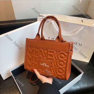 Luxury Marc Jaobs TOTE Bag Designer Women Mens Work Bag Luksusowe torebki sprzęgło Cross Body Bag Torka zakupowa