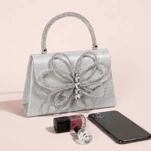 Luxury designer Evening Bags New Full Diamond Bow Fashionable Dinner Bag Sparkling Diamond Inlaid Handbag Flip Top Handheld Crossbody Bag