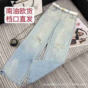 Kvinnors jeans designer 24 ny fashionabla bantning och slitna midjeband med perforerade denim raka benbyxor e3b4