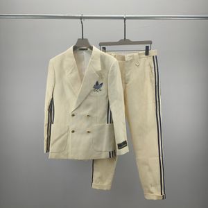 2024 Mens ternos de roupas ocidentais designers homens letra clássica impressão outono de luxo casaco de roupas magras de fábrica de retalhos de traje feminino