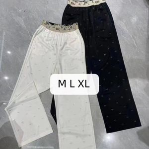 女性の光沢のある明るいダイヤモンドロゴレターエラスティックウエストルーズサテンデザイナーズボンmlxl