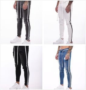 Sidränder nödställda rippade tvättade förstörda raka smala fit jeans modedesigner vintage lappar affär elastisk casual t6601652