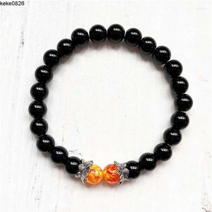 Strand Black Lava Stone Lotus Charm Naturalne okrągłe koraliki Bransoletka dla mężczyzn Kobiet Elastyczne bransoletki Ręcznie wykonana biżuteria