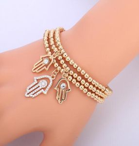 Gold Evil Eye Armband Turkish CZ Crystal Small Charm Hand of Hamsa Armband för kvinnor Elastic Chain Fashion Bead smycken gåvor5237619