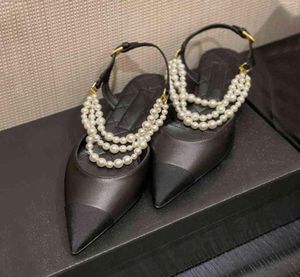 Pearl Chain Baotou Sandals 2022 Ny färgmatchning spetsiga plattbotten Franska damskor Läder Hög klackar1713115