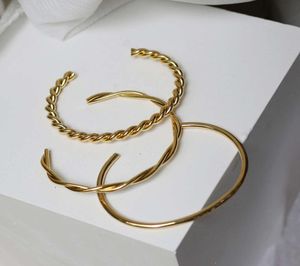Nowa modna stal stalowa rozszerzalna bransoletka 18K Gold Slated Twisted Cuff Bransoleta Femme 20213418359