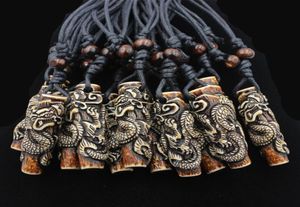 Lots Whole 12pcs COOL Boy men039s Simulation Bone Carving Totem Dragon Pendant Wood Beads Amulet Pendant Necklace Lucky Gif2490024