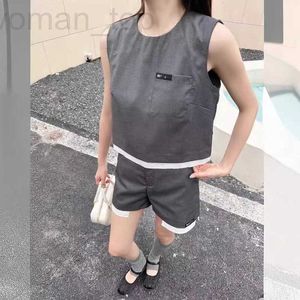 Women's Two Piece Pants Designer 2024 Summer New Product Simple Contrast Color Splicing Fake Shorted Top Tank Straight Short Shorts for Women 6TTM