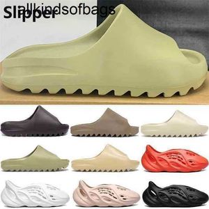 Mode -Slipper Kanyes Plattform Schaumschuh Slipper Sandalenschuhe Harz Drei schwarze weiße Knochen Erde braune Männer Frauen Stylist rutschen Sandalen Sommer Luxurys MPE9