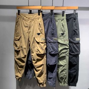 Calça de calça masculina Designer de esportes americanos minimalistas ao ar livre calças de trabalho casual para o outono masculino e inverno novas leggings de bolso multi cortado tendência 3d0m