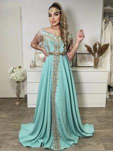 2024 Nowoczesne arabskie sukienki kaftanowe złote koronkowe aplikacje frezowanie Tassel krótkie rękawy A-line długa formalna suknia imprezowa Dubai Caftan Sukienka dla kobiet
