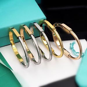 Modedesigner lås u-form diamant armband silver rosguld rostfritt stål armband armband för kvinnor lyxsmycken med dammväska v58