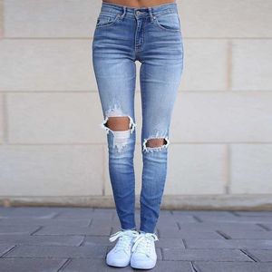 Kvinnors jeans kvinnor casual denim stretch hål jeans mitt midja jeans damen hög elastisk push up stretch jeans tvättade denim mager blyertsbyxor y240604r0ku