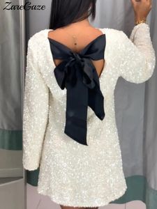 Elegant bowknot paljettparty klänning kvinnor långärmad jul glänsande miniklänningar kvinnlig sexig klippa ut backless kväll vestidos 240531