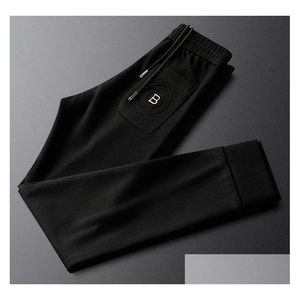 Męskie spodnie wiosna jesień mężczyźni swobodne sportowe jogging listu sportowa drukowana uliczna azjatycka rozmiar m5xl upuszczanie odzieży OTFS9
